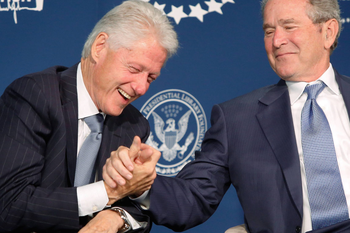 Former U.S. presidents George W. Bush and Bill Clinton shake hands after Bush gave Clinton advice on how to be a grandfather, as they participate in an onstage conversation at a Presidential Leadership Scholars event at the Newseum in Washington September 8, 2014. The Presidential Leadship Scholars program is a joint venture of the presidential centers of former presidents Lyndon B. Johnson, George H. W. Bush, Bill Clinton and George W. Bush.  REUTERS/Jonathan Ernst    (UNITED STATES - Tags: POLITICS EDUCATION)